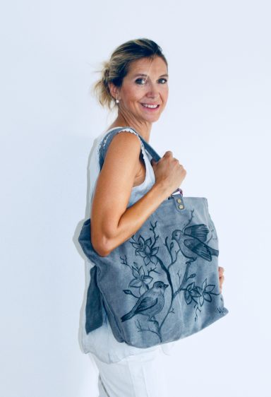 Bolso de piel vuelta con pájaros